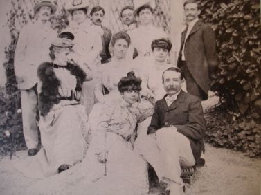 Proust and friends.  Winnaretta is sitting in the middle of the picture, Proust appeared at the back, third person from the left